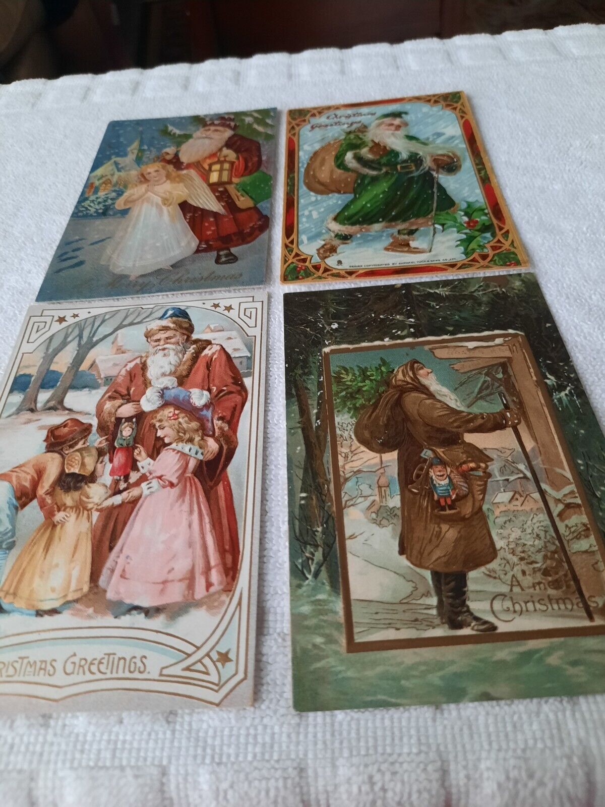 Four Antique SANTA Postcards Early 1900s Printed In Germany EMBOSSED ORIGINALS 