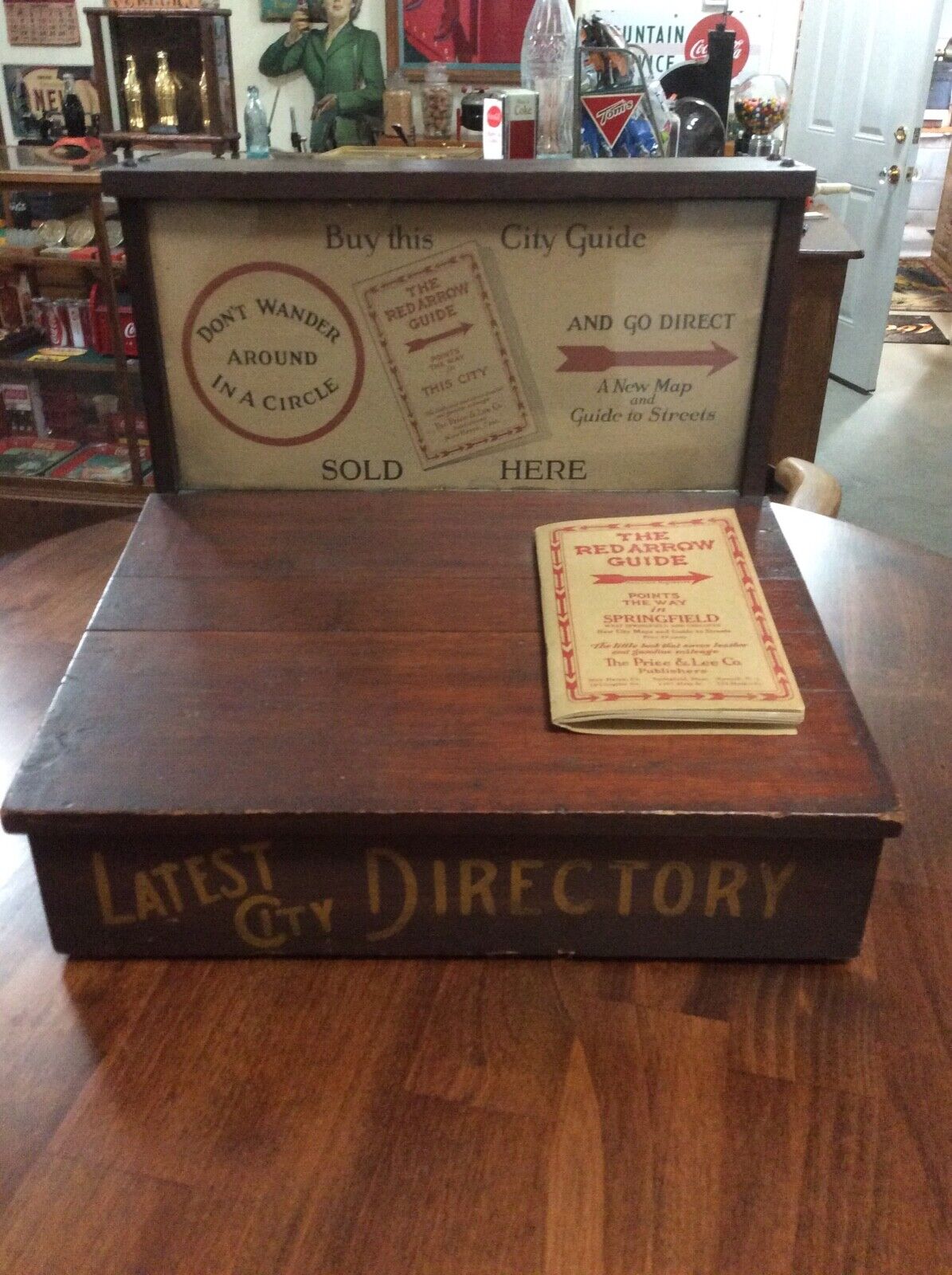 Red Arrow city guide, map, store, gas station, counter top display case, 1920s