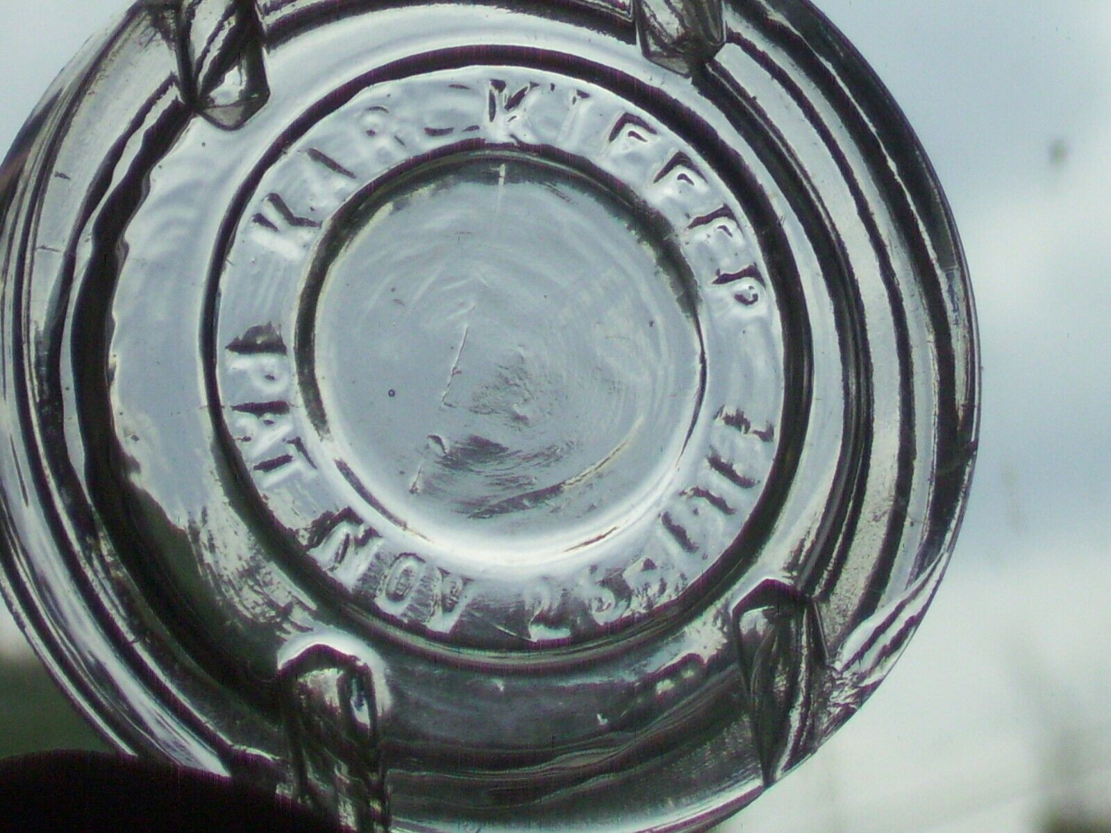 clear glass Karl Keffer Pat. Nov. 25, 1913 food jar lid. nicks in the glass