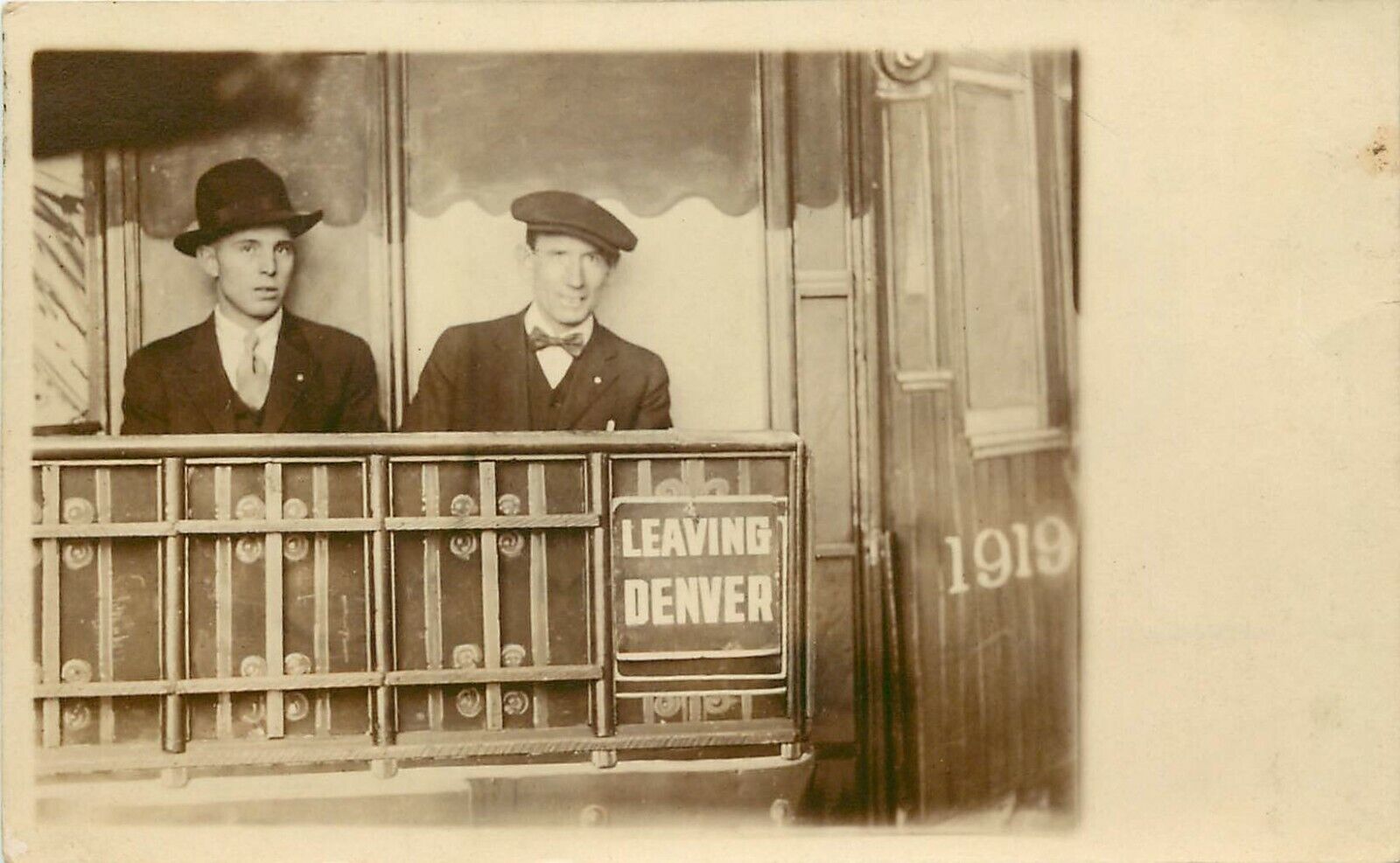 1919 RPPC Postcard Men on Train Leaving Denver CO, Electric Studio Photo
