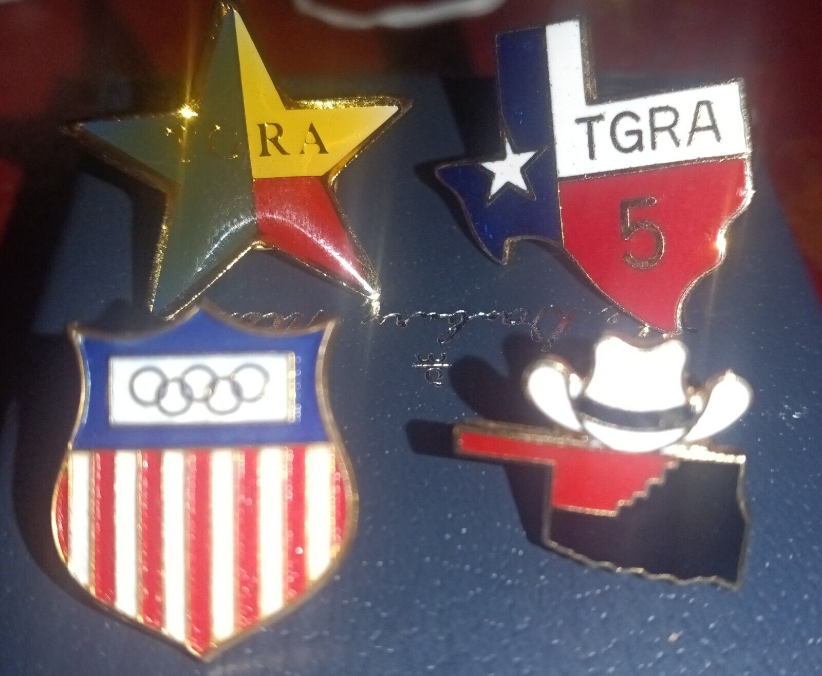 Vintage Olympics pin and 2 TGRA Texas pins and Cowboy America pin