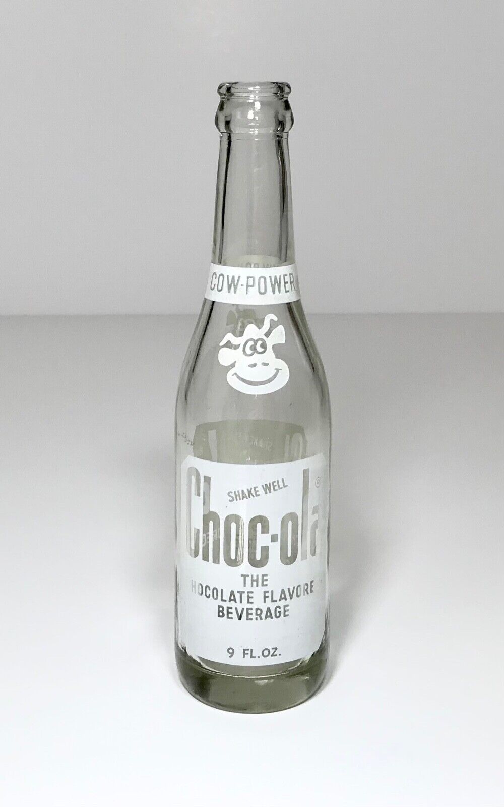 CHOC-OLA FLAVORED CHOCOLATE BEVERAGE CLEAR GLASS 9 OZ BOTTLE PAINTED LABEL1980s