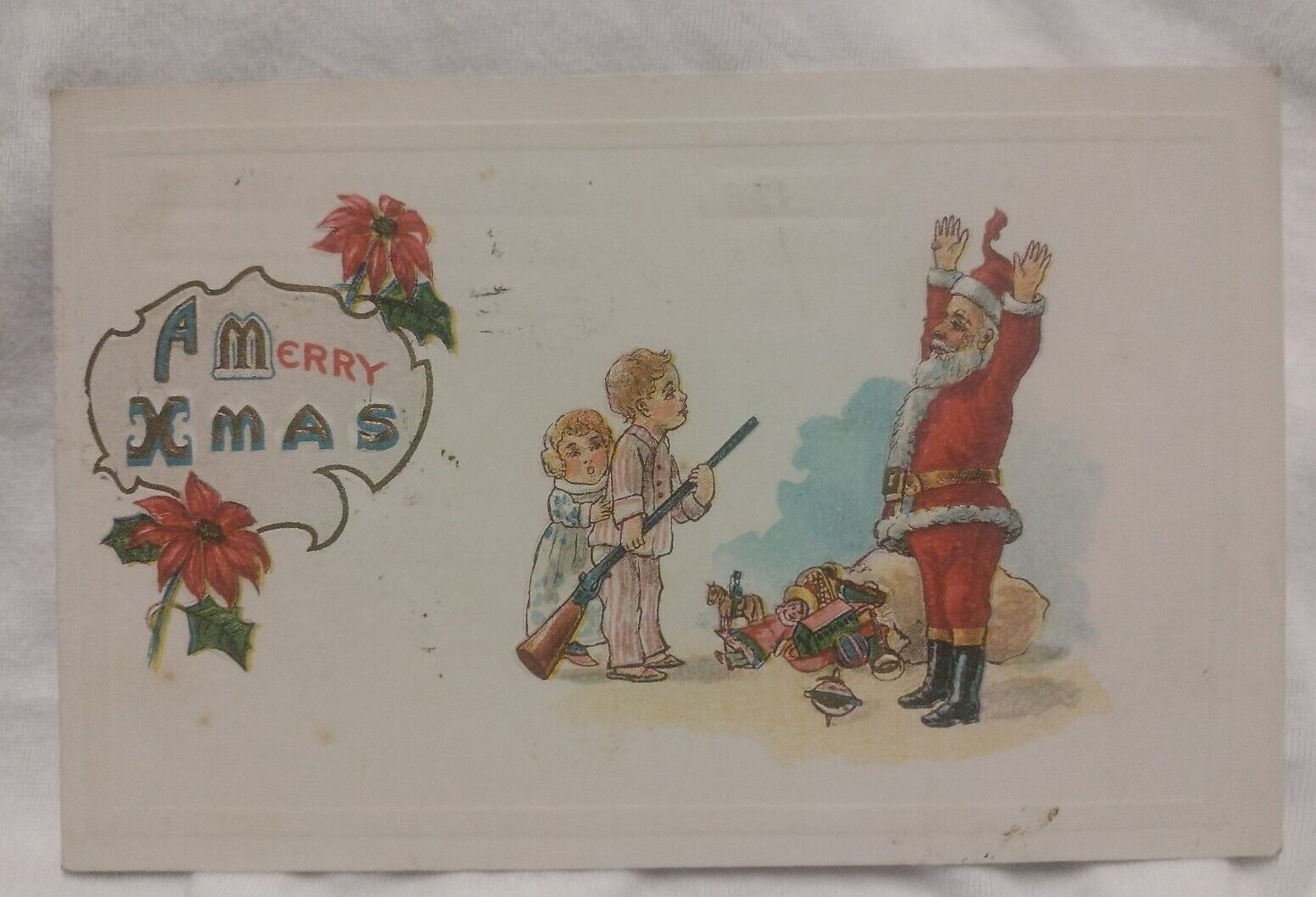 Postcard Merry Xmas Children Holding Santa Claus at Gunpoint Christmas c1910