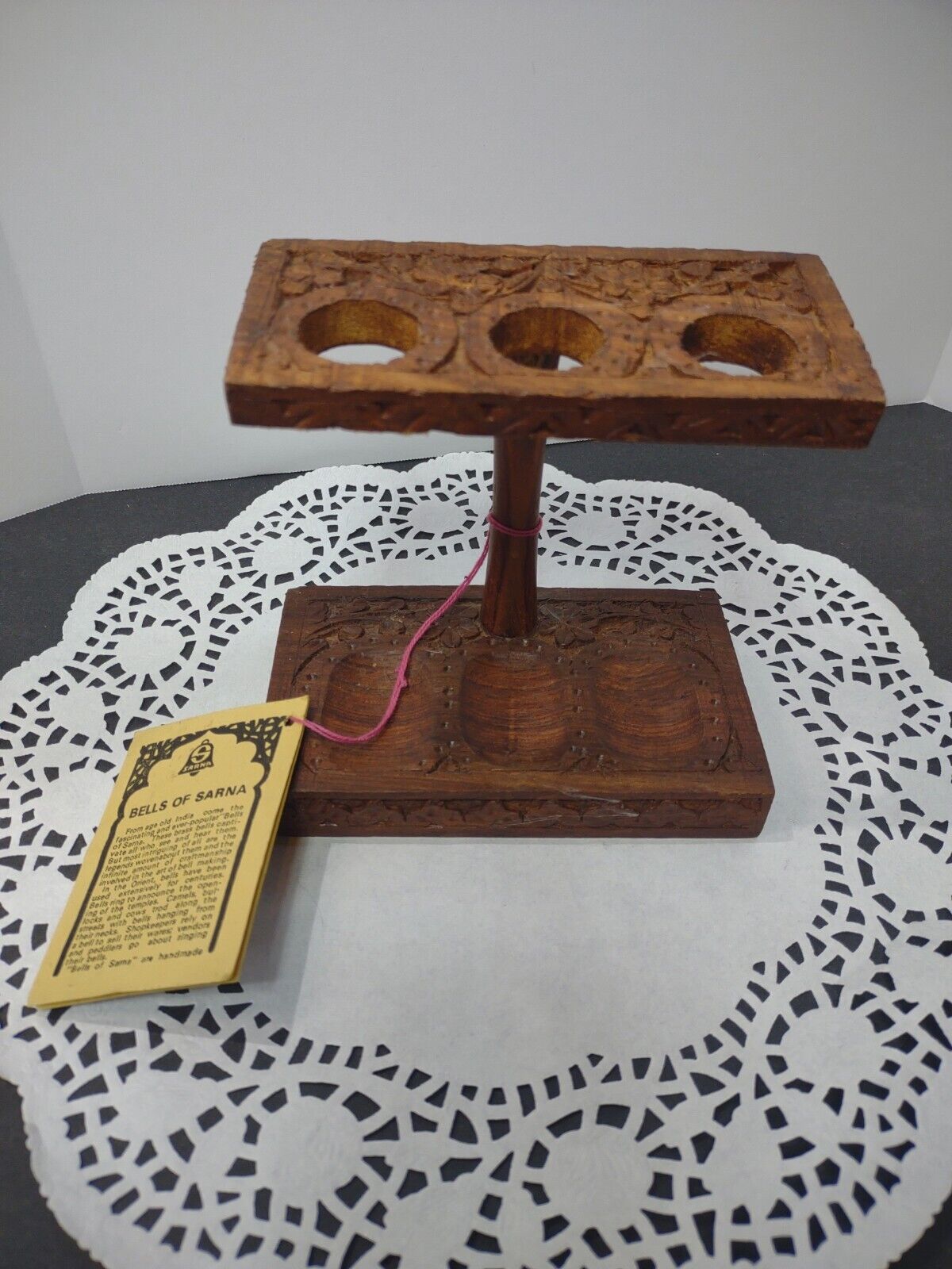 VTG Bells of Sarna India hand carved wooden  stand , with literature S. S. Sarna