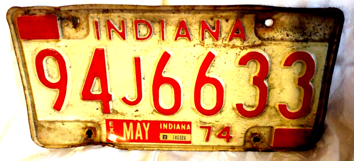 Indiana Lake County 1974 Red on White Metal Expired License Plate 94J6633