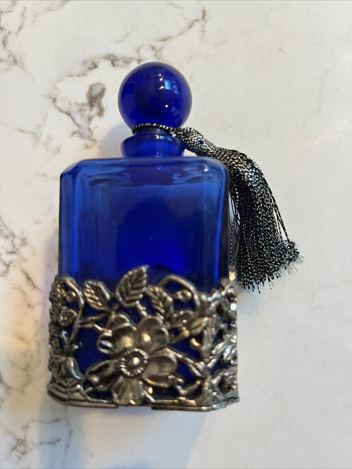 VTG Cobalt Blue Glass Perfume Bottle With Floral Silver Tone Metal Base W/Tassel