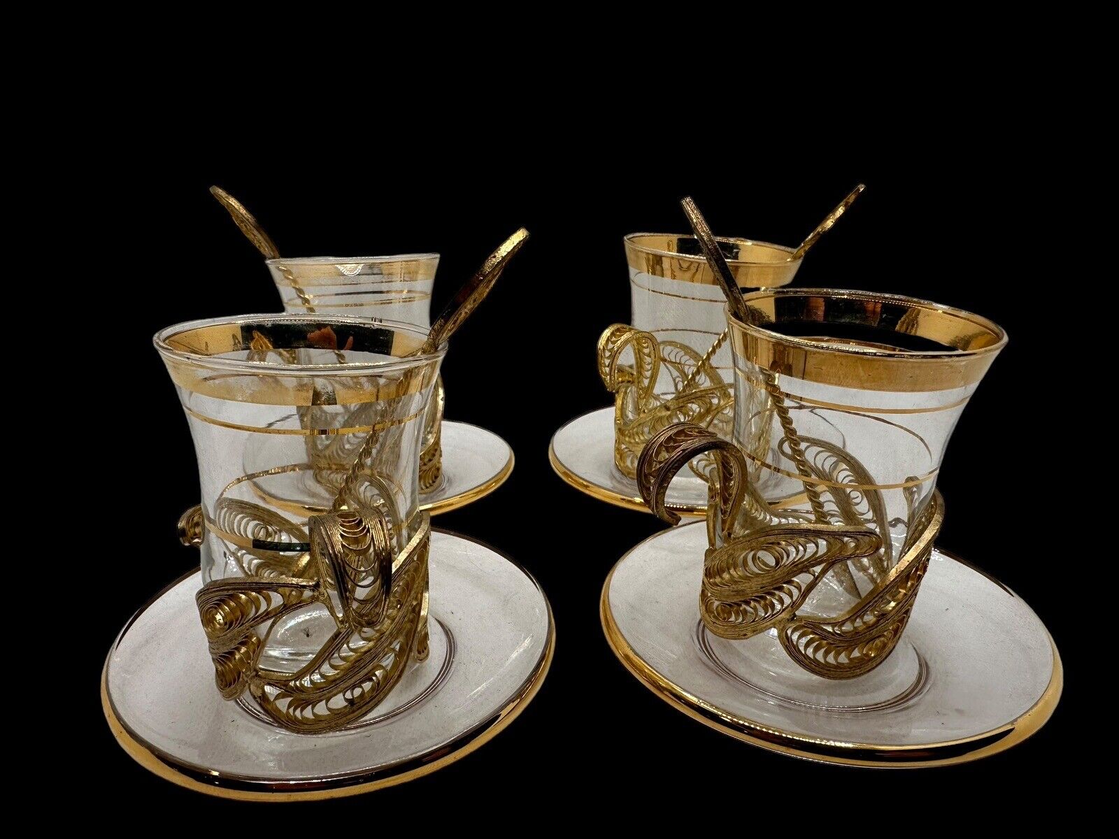 set of 4 gold tone Turkish Demitasse cups with saucers and spoons 