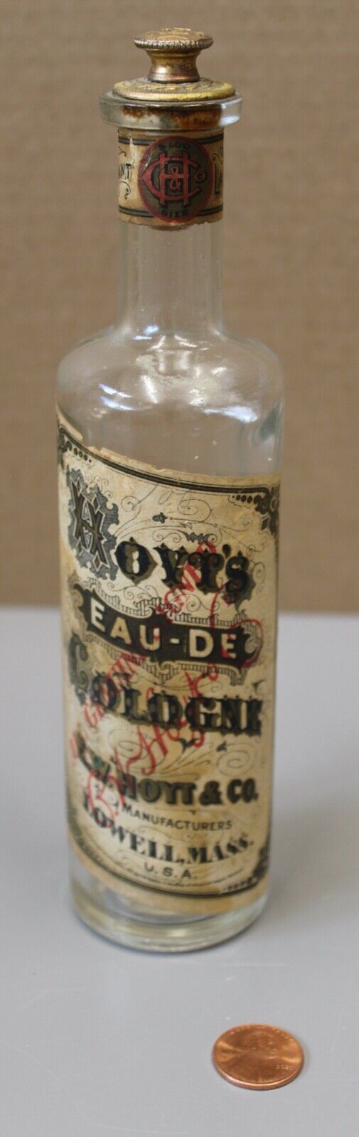 07/05.  Hoyt's Eau-De Cologne 5oz. Glass Bottle with Original Stopper and Label