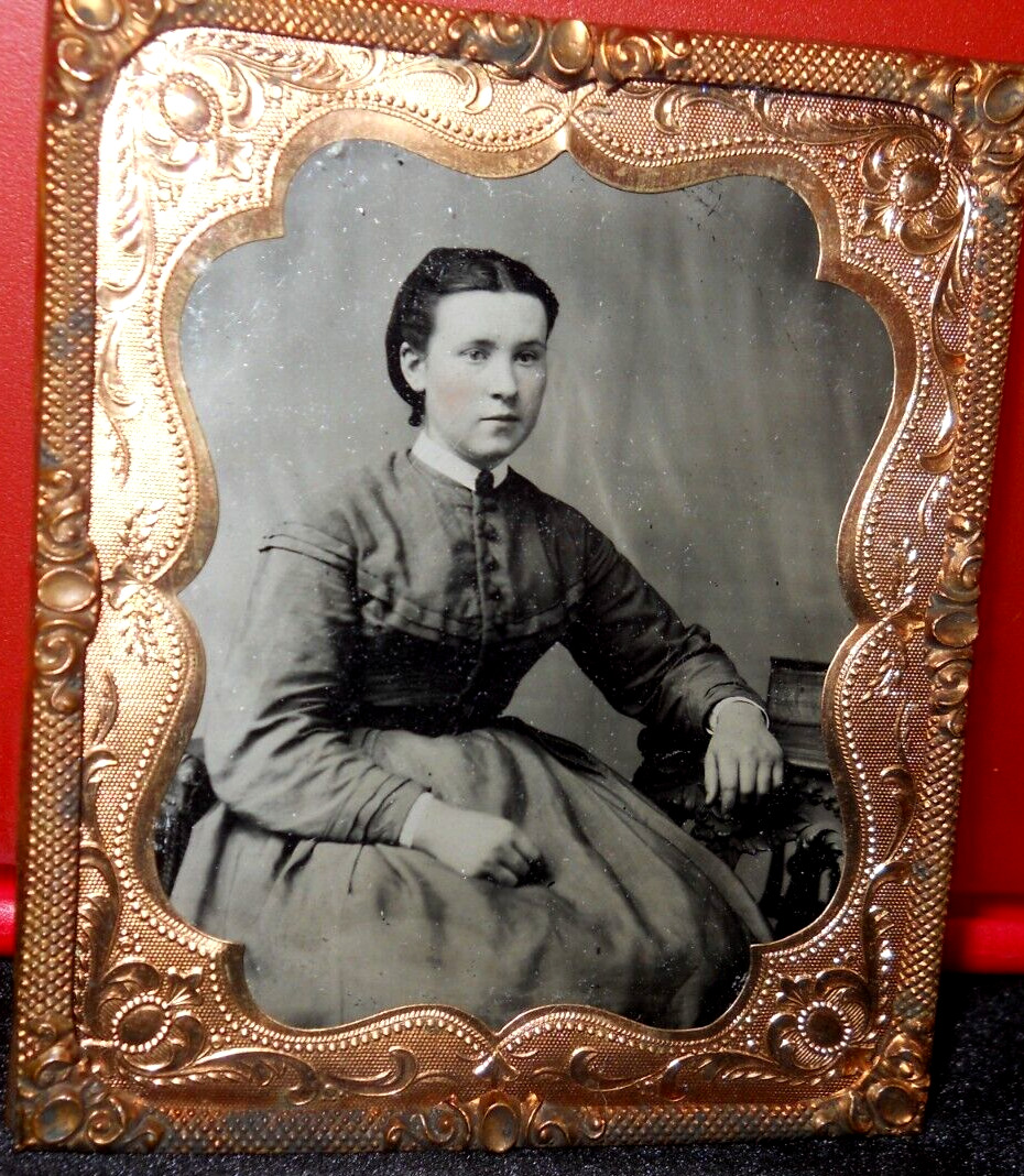 Sharp 1/6th Size Tintype of young lady in brass mat/frame