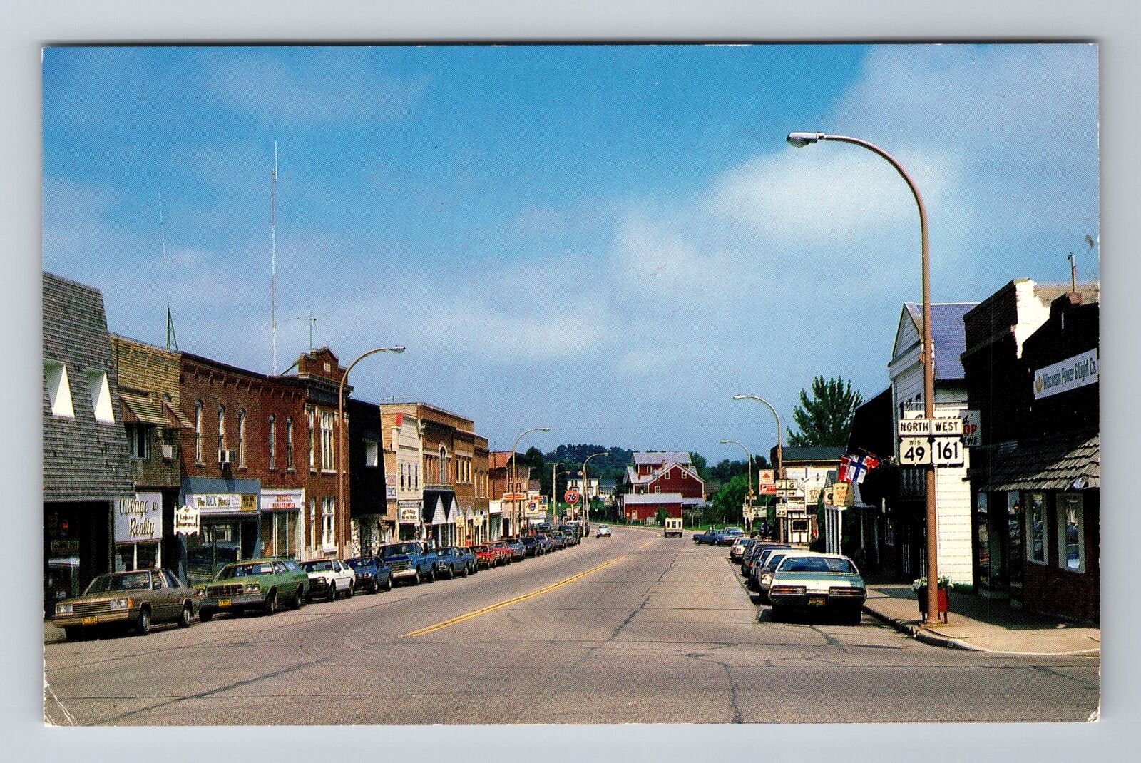 Iola WI-Wisconsin, Downtown, Advertising, Antique, Vintage Souvenir Postcard