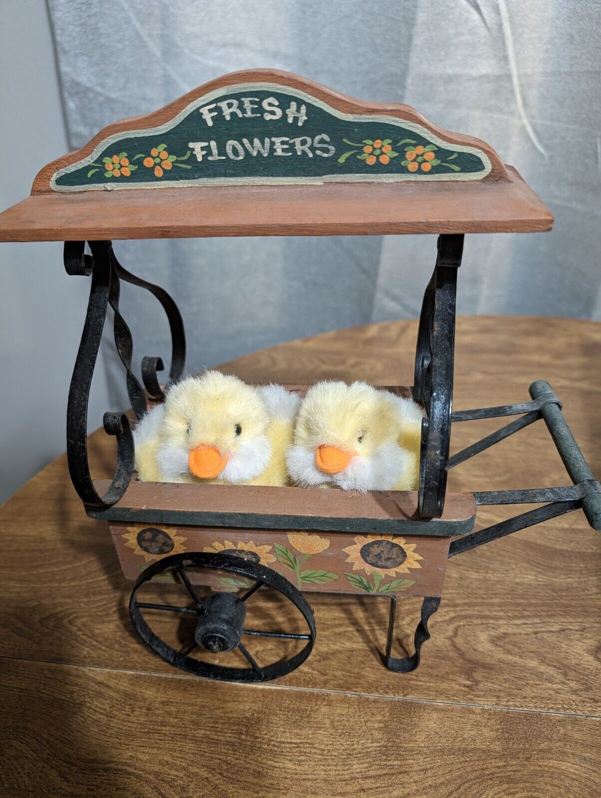 Springtime Delight: Adorable Easter Chicks in a Flower Wagon