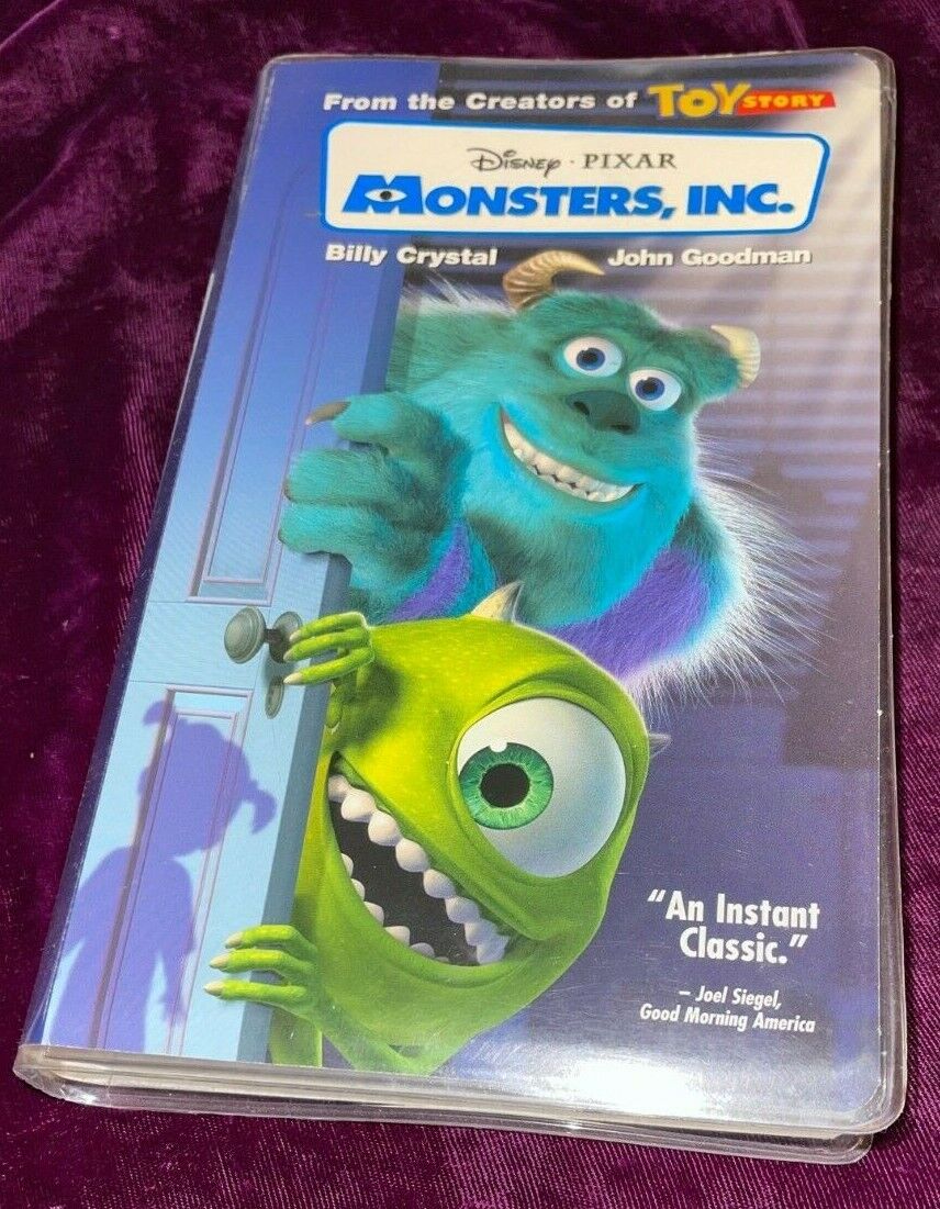 RARE MONSTERS INC VHS TAPE VINTAGE DELUXE CLAMSHELL CASE PIXAR 
