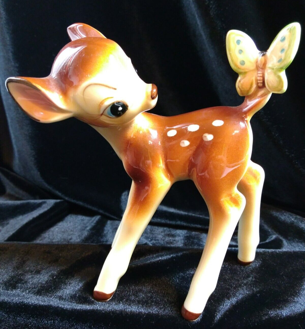BAMBI figurine from Disney. Butterfly on his tail. DS07