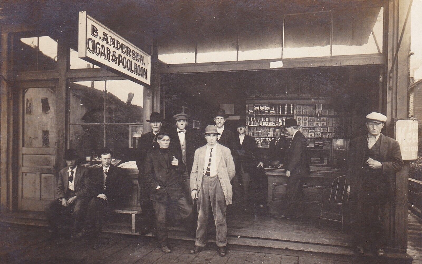 Amazing RPPC Real Photo Postcard of B. Andersen Cigar & Poolroom Store Front