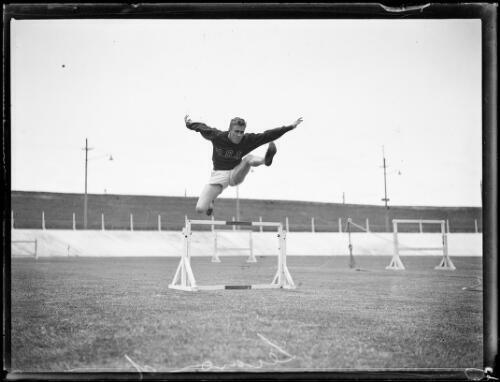 American athlete Leo Lermond jumping a hurdle, NSW, 11 January 1930 Old Photo