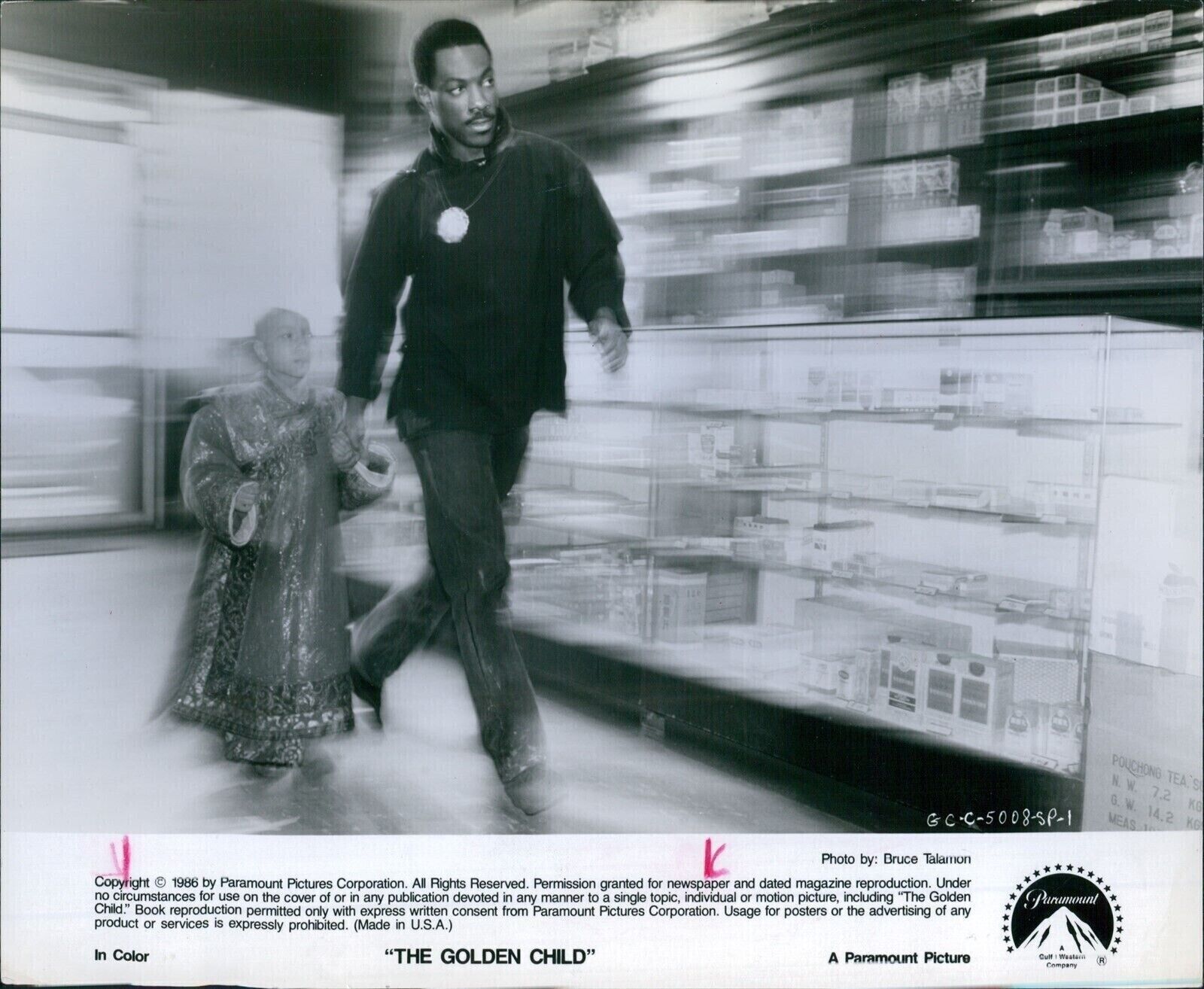 1986 Actor Eddie Murphy Rescues J L Reate In The Golden Child Movie 8X10 Photo