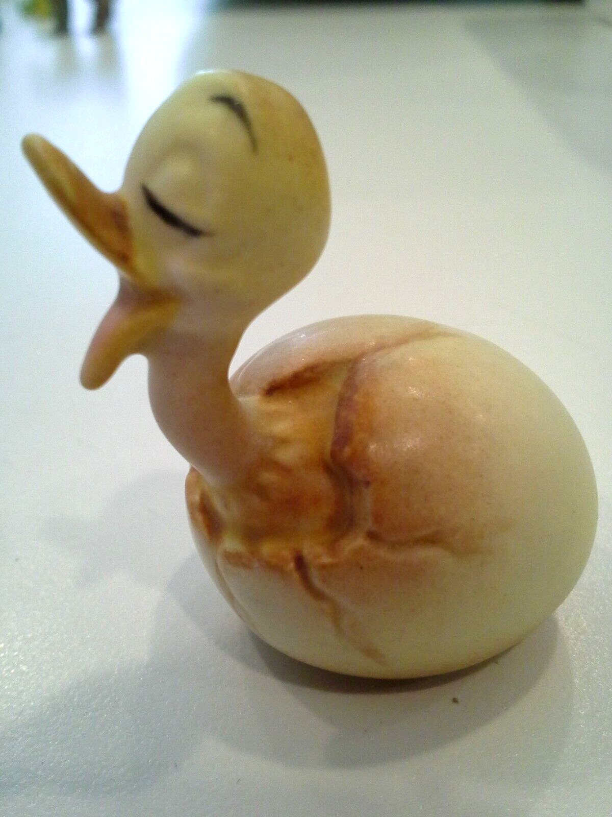 Vintage baby duckling breaking out of egg miniature figurine