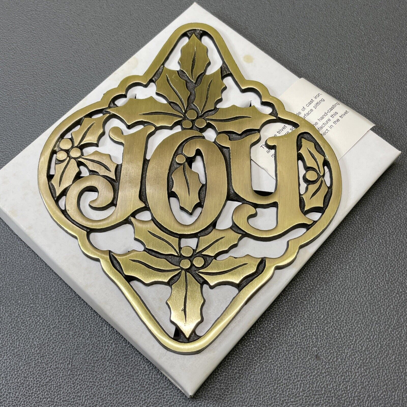 Vintage Avon Cast Iron Trivet Logo Joy with Holly Leaves Gift Collection Rare