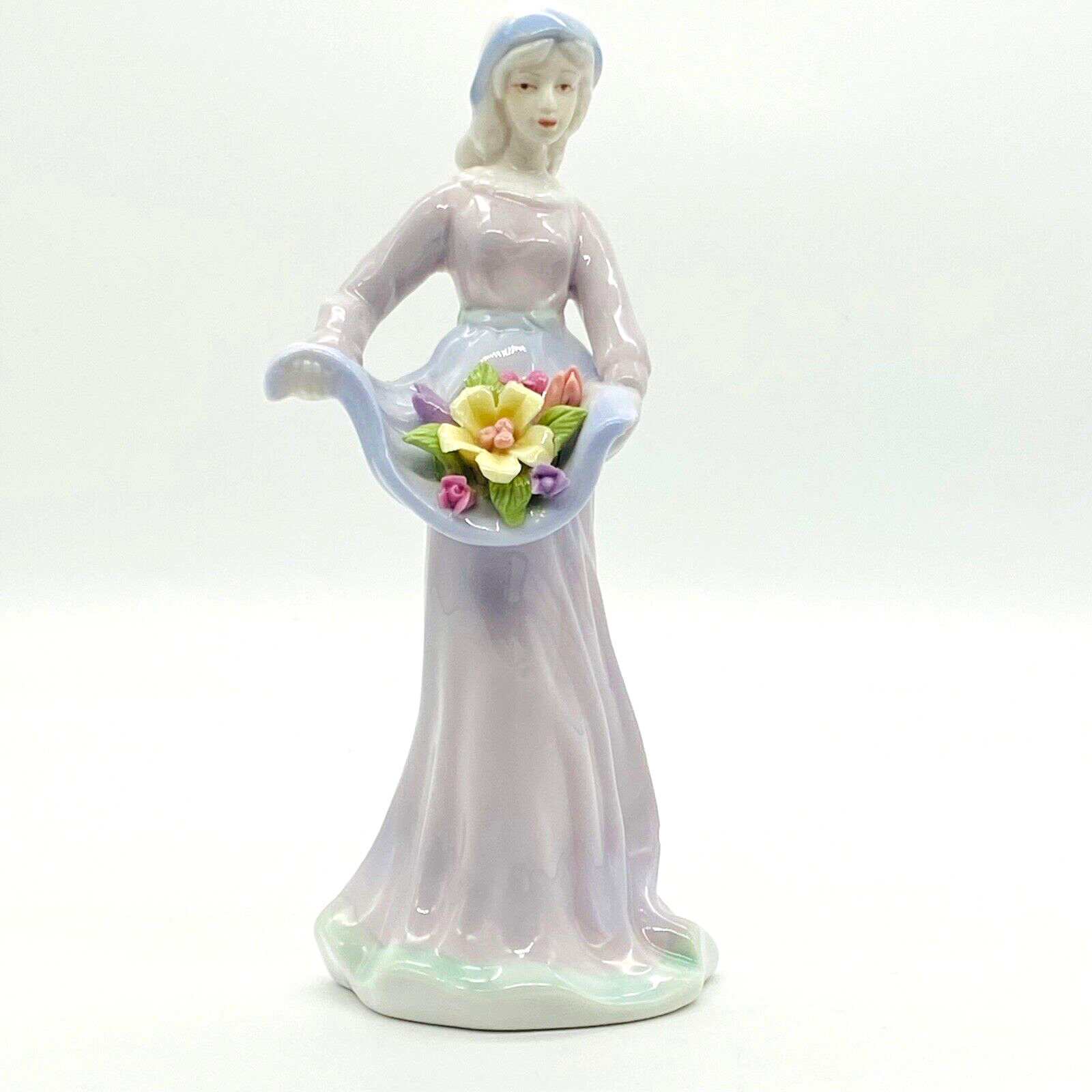 Porcelain Lady Figurine Holding Flowers in Apron Sculpture Women Glazed Statue
