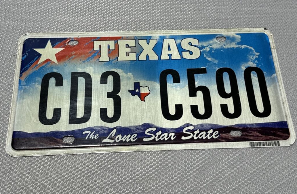 Texas License Plate CD3 C590 Car TX 2009 Clouds Lone Star State Flag Used Colors