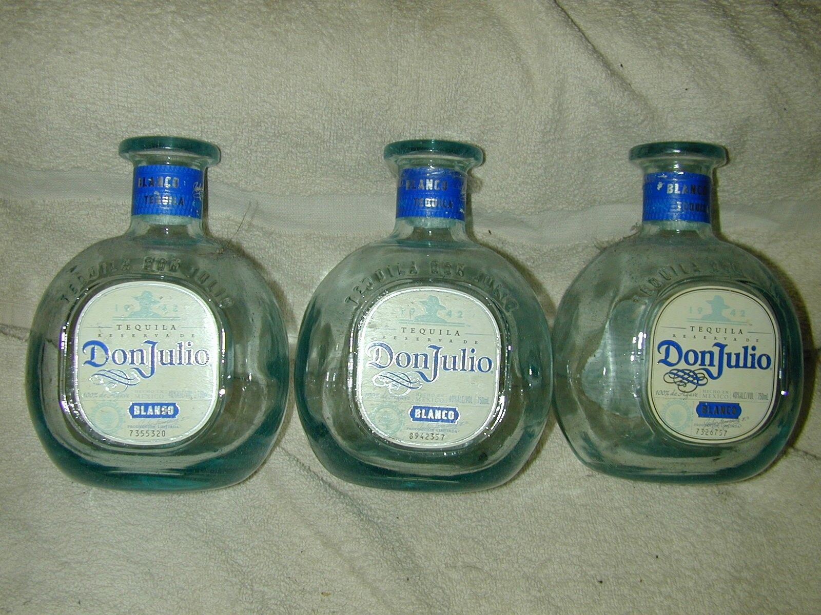 (35) DON JULIO 750ML BLANCO WHITE TEQUILA BOTTLES (EMPTY) NO/TOPS  USED RECYCLED