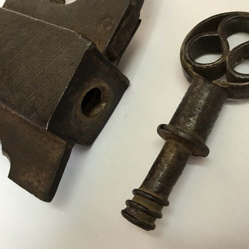 An antique Iron Trick or Puzzle padlock or lock with SCREW TYPE Key.