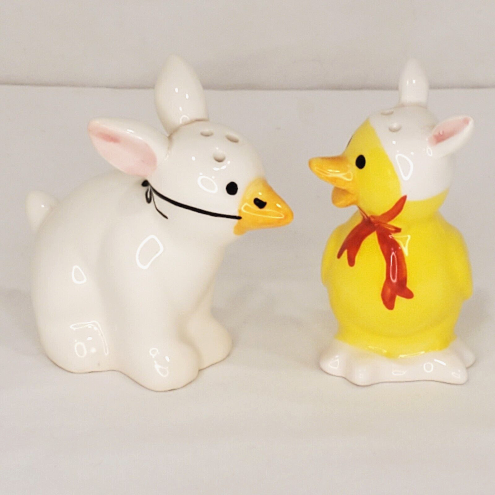 Chick Disguised as Duck & Duck In Chicken Costume Ceramic Salt & Pepper Shakers