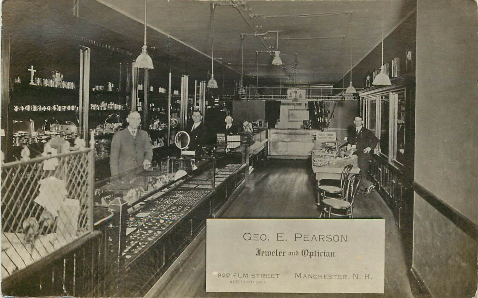 1915 RPPC G.E. Pearson Jeweler & Optician Shop Interior Elm Street Manchester NH