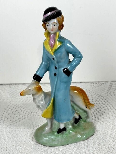Made in Japan Post WWII elegant lady figurine walking the dog