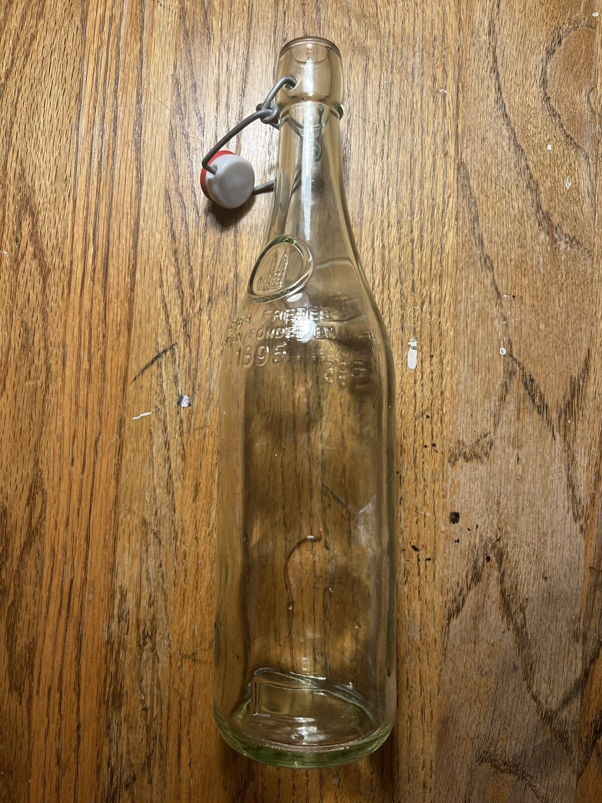 Geyer Freres Maison Fondee 1895 Glass Bottle w/ Wire Bale Stopper Swingtop 750mL