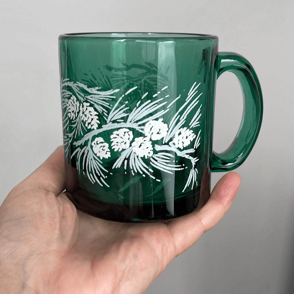 Vintage coffee mugs green glass pine cones USA made.