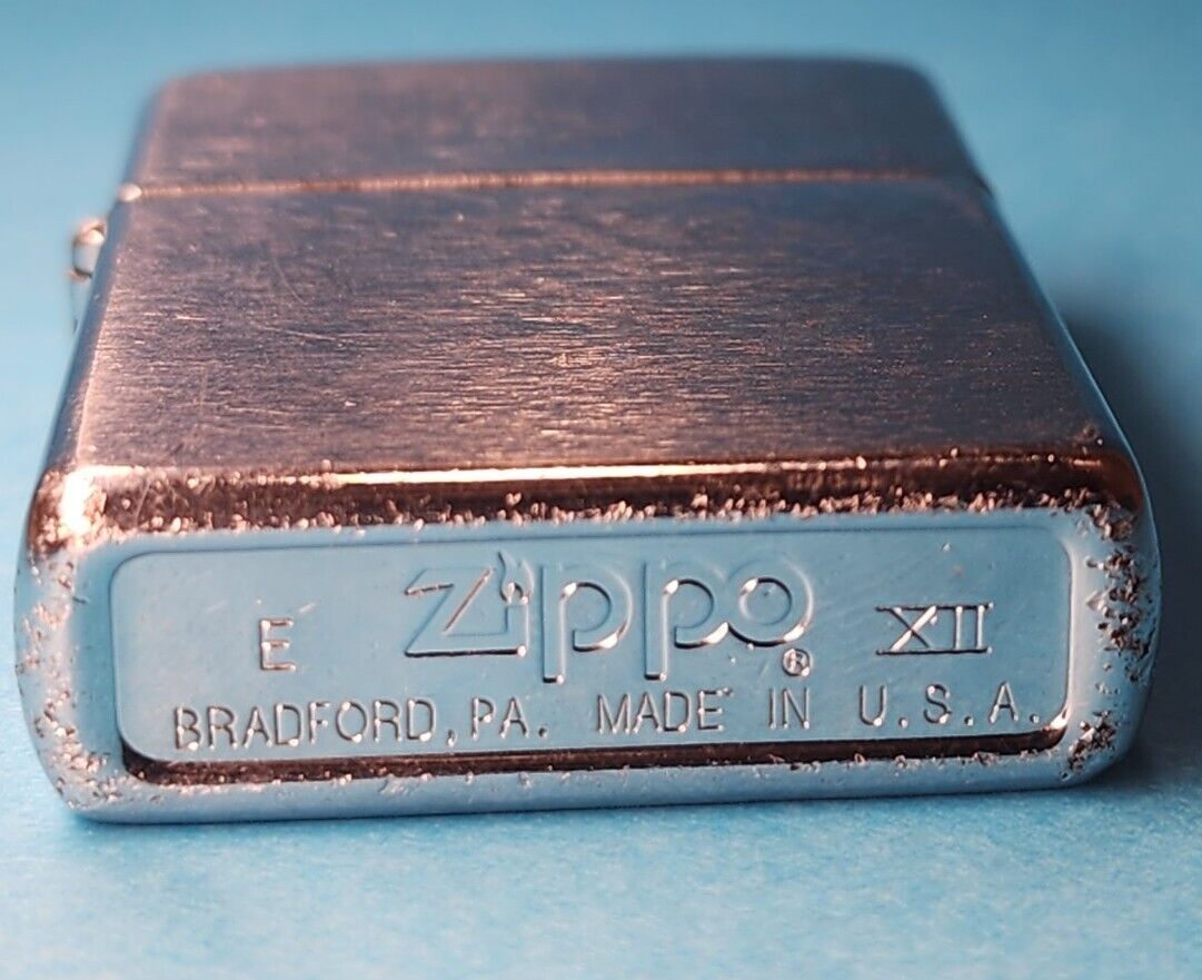 Vintage 1996 E XII Zippo Cigarette Lighter High Polished Plain Silver