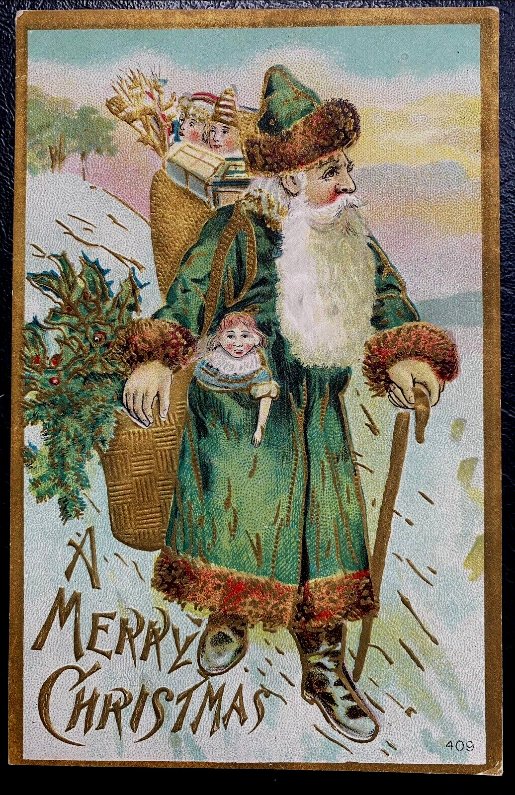 Green Robe Santa Claus in Snow~with Toys~Doll~Antique ~Christmas Postcard~k162