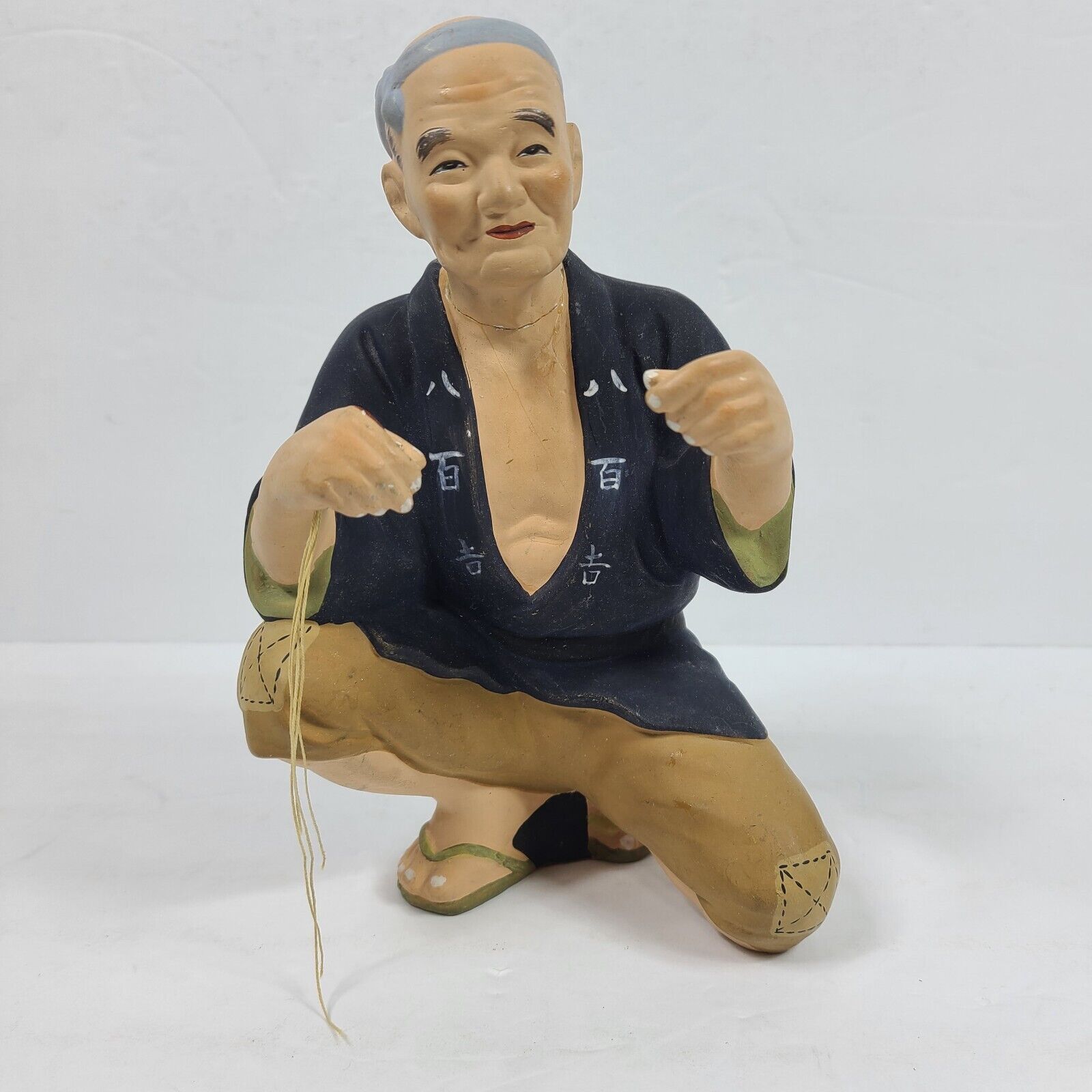 Japanese Old Man Kneeling Down String In Right Hand 8\