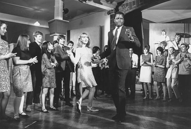 Actors Sidney Poitier And Judy Geeson Dancing In Front Of A Crowd Old Photo