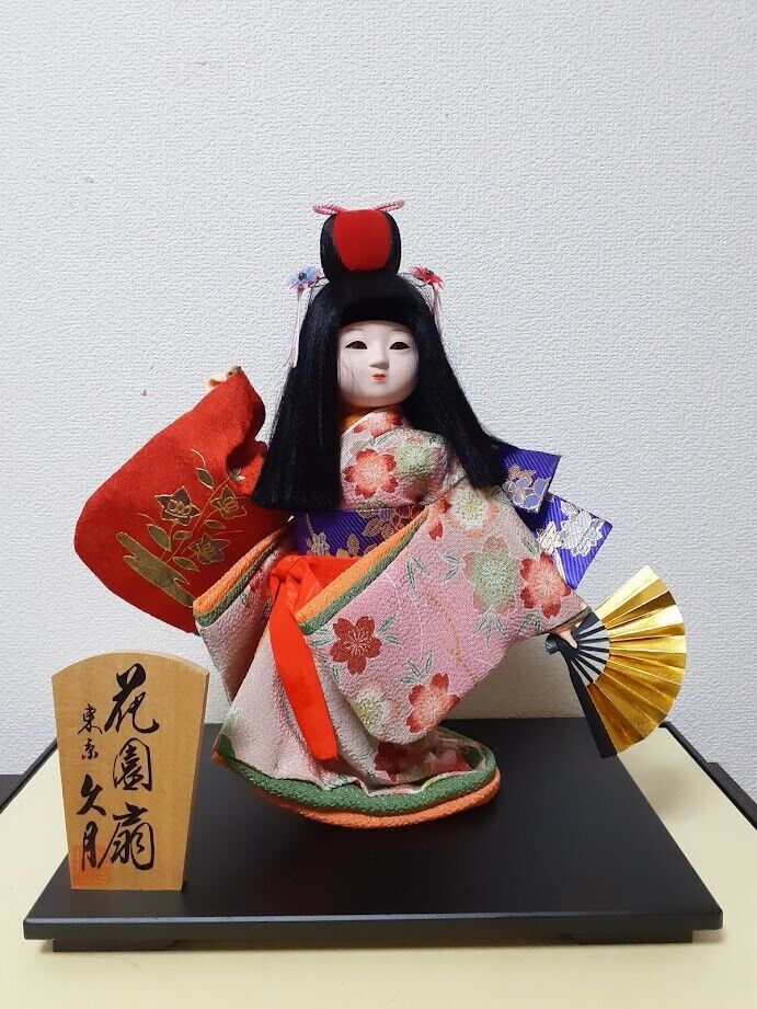 Vintage girl dancing with a folding fan produced by Kyugetu in Japan