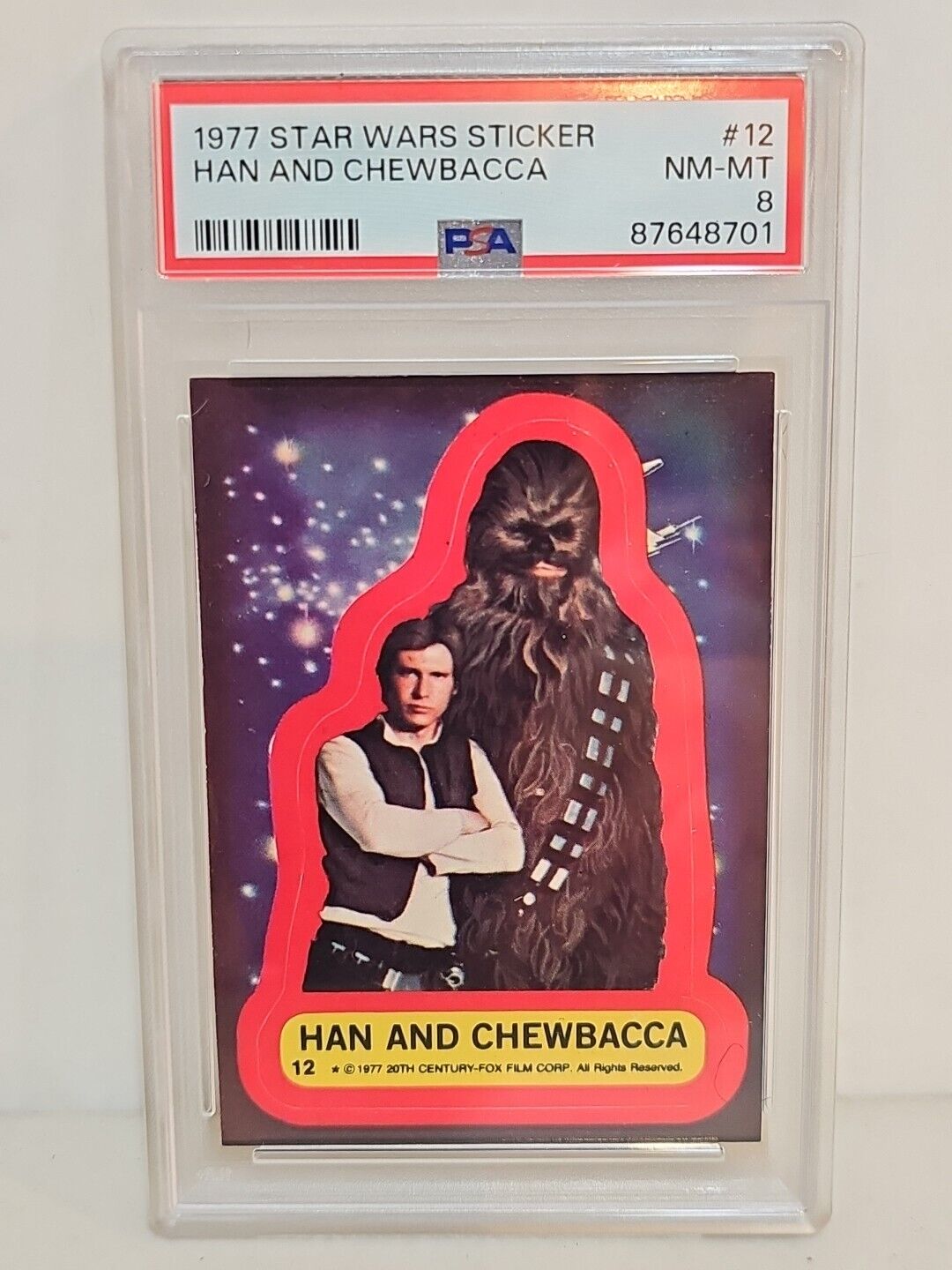 Topps STAR WARS sticker #12 Han Solo & Chewbacca 1977 trading card PSA 8 