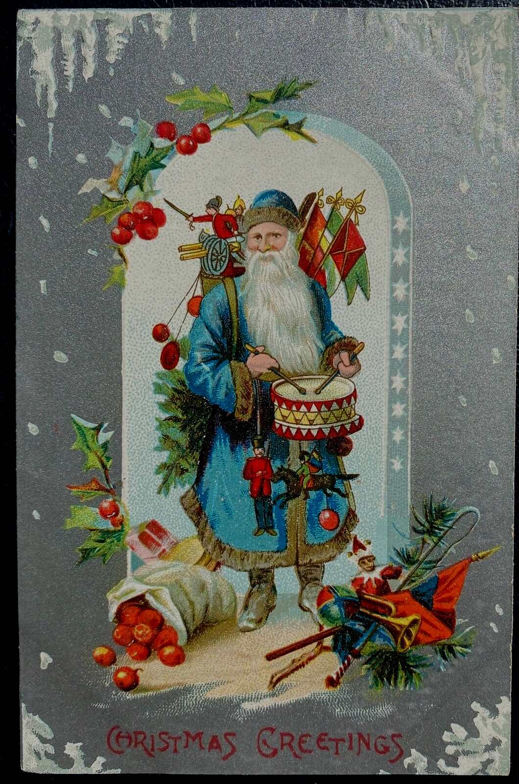 Blue  Robe Santa Claus with Flags~Toys~Drum~Apples~1910 Christmas Postcard~k274