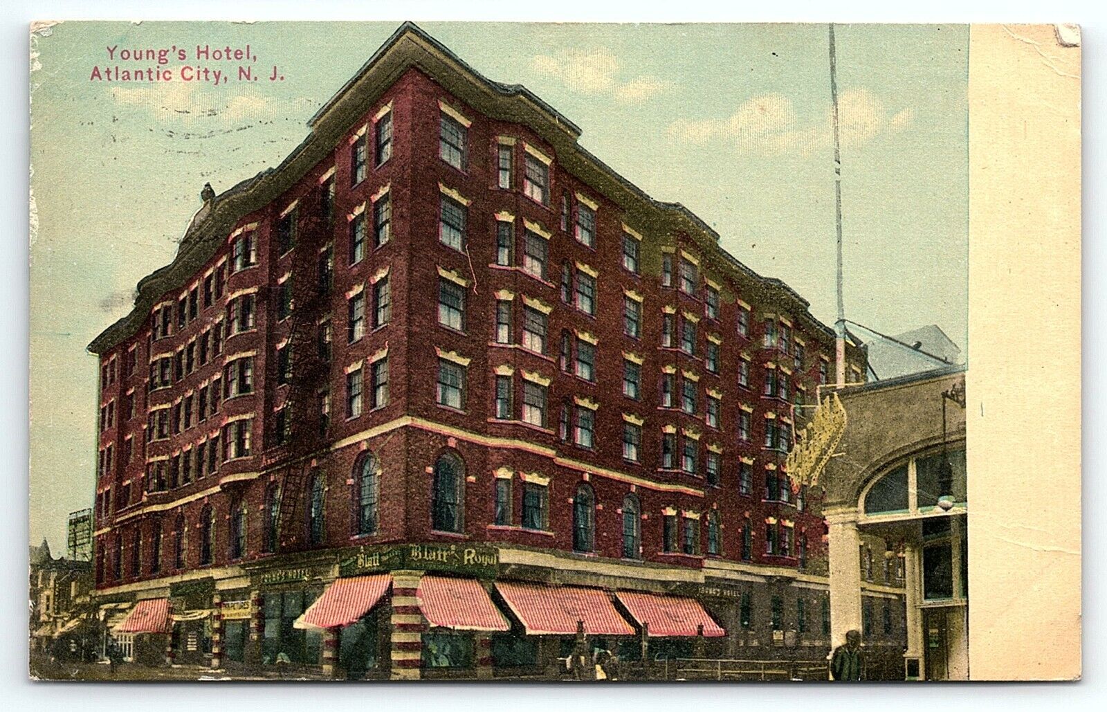 1912 ATLANTIC CITY NJ YOUNG'S HOTEL STREET VIEW BUSINESS AD POSTCARD P2101