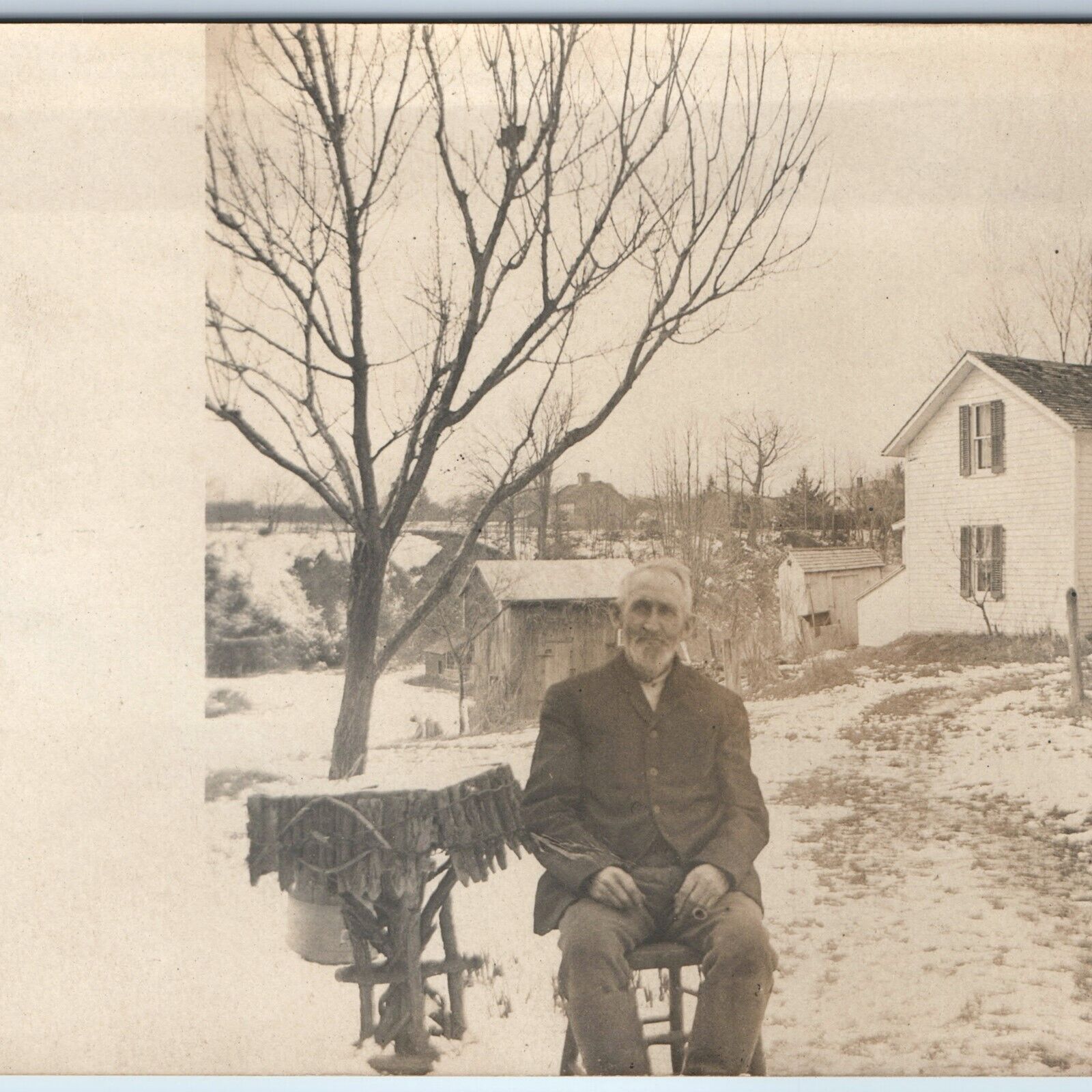 c1910s Old Man Alone Outdoors Pose RPPC House Farm Chair Table Real Photo A261