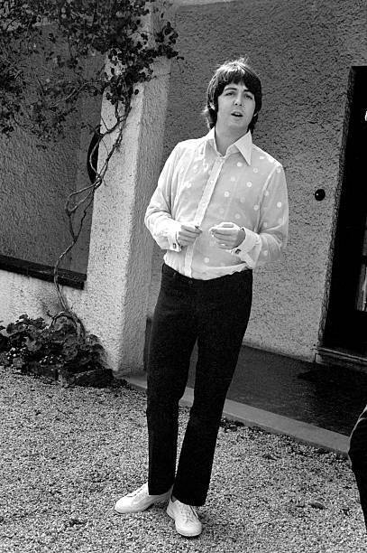 Beatles singer Paul McCartney relaxing in the grounds of his f- 1968 Old Photo