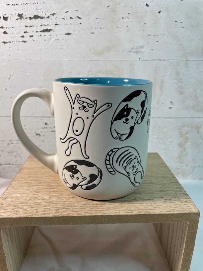Whimsical Cats in Hats Clothes Ceramic Coffee Mug White Black Turquoise Interior