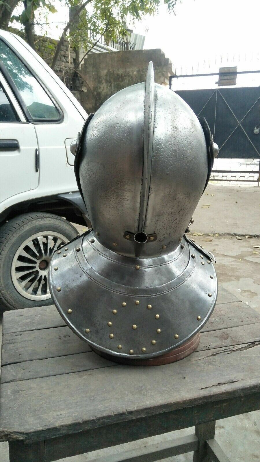 Antique medieval knight Iron tournament helmet with tight armor helmet