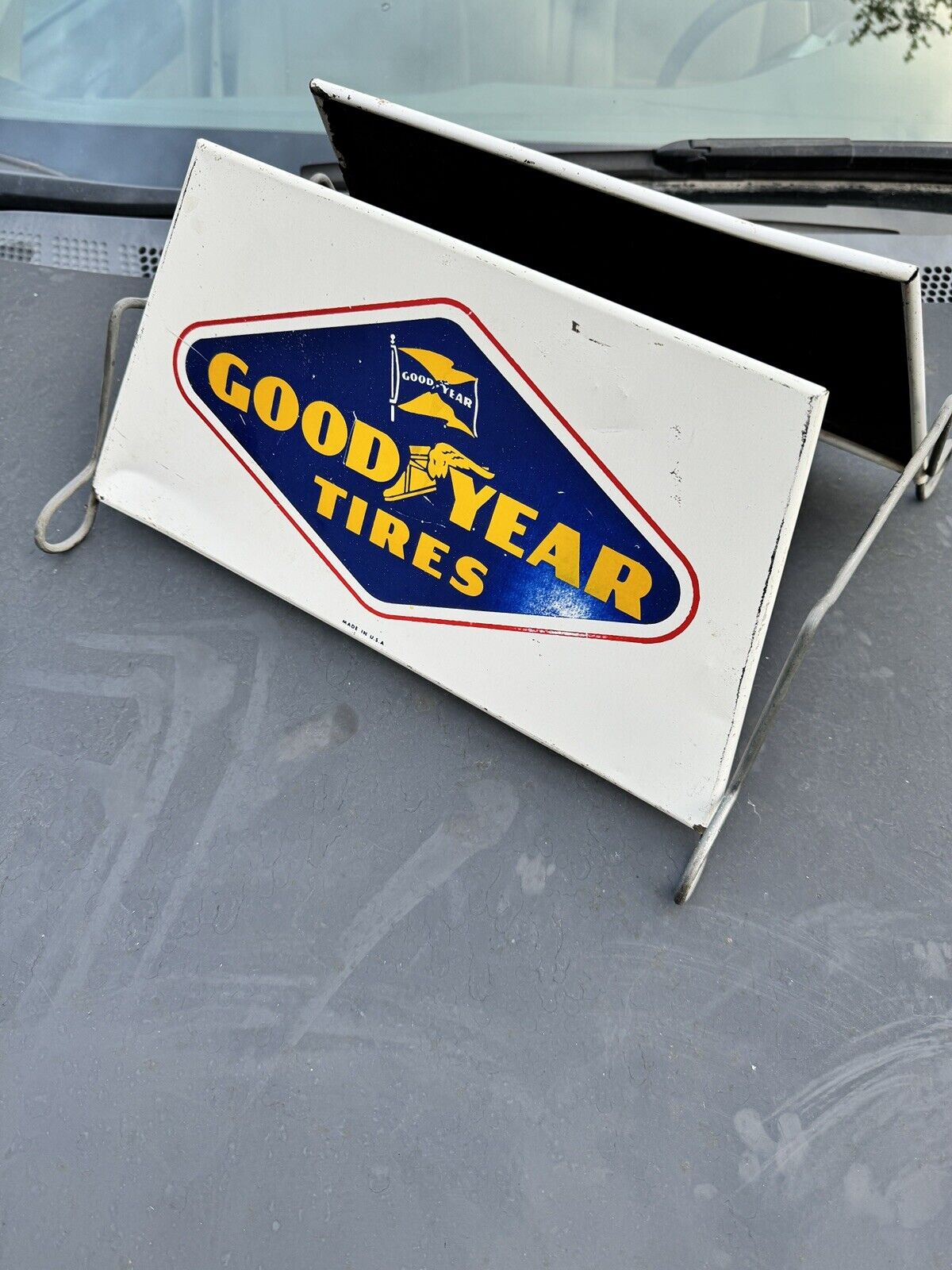 Vintage original GOODYEAR TIRES advertising metal rack sign w/ wingfoot logo