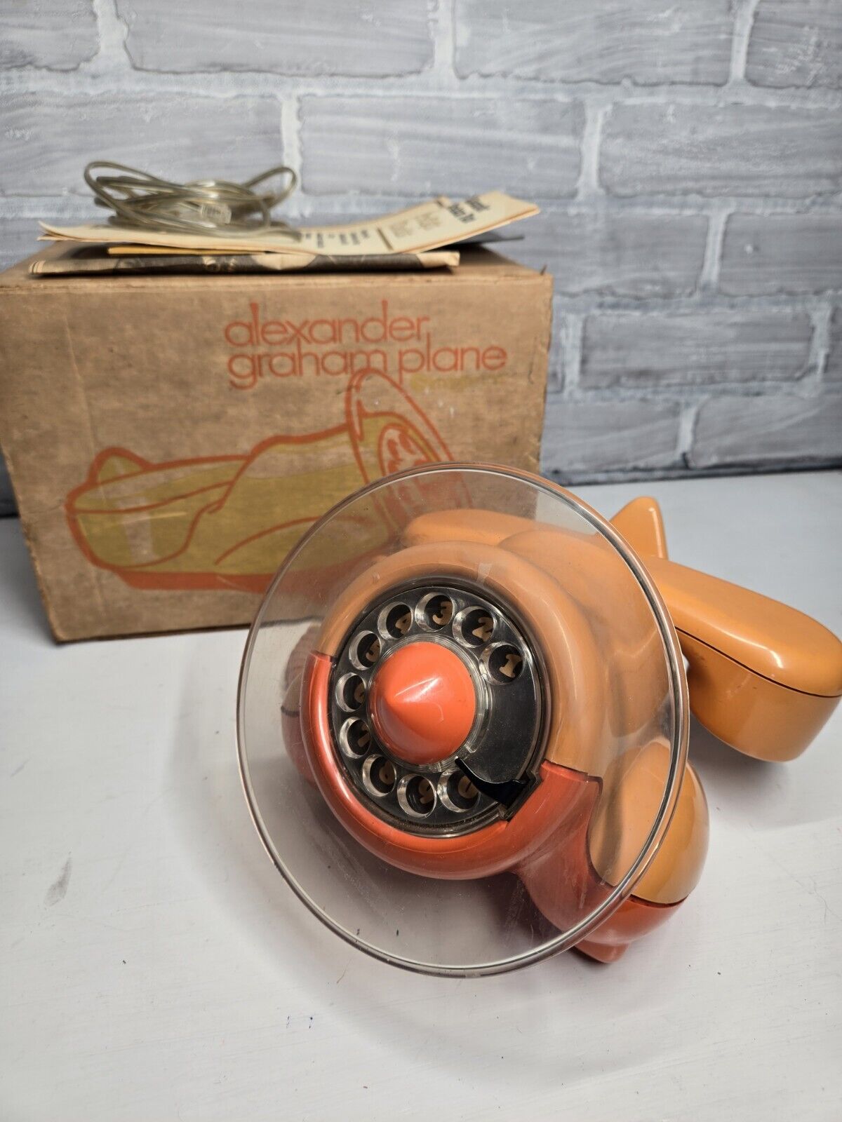 Vintage MCM 1970’s Retro Orange Alexander Graham Plane Rotary Phone 