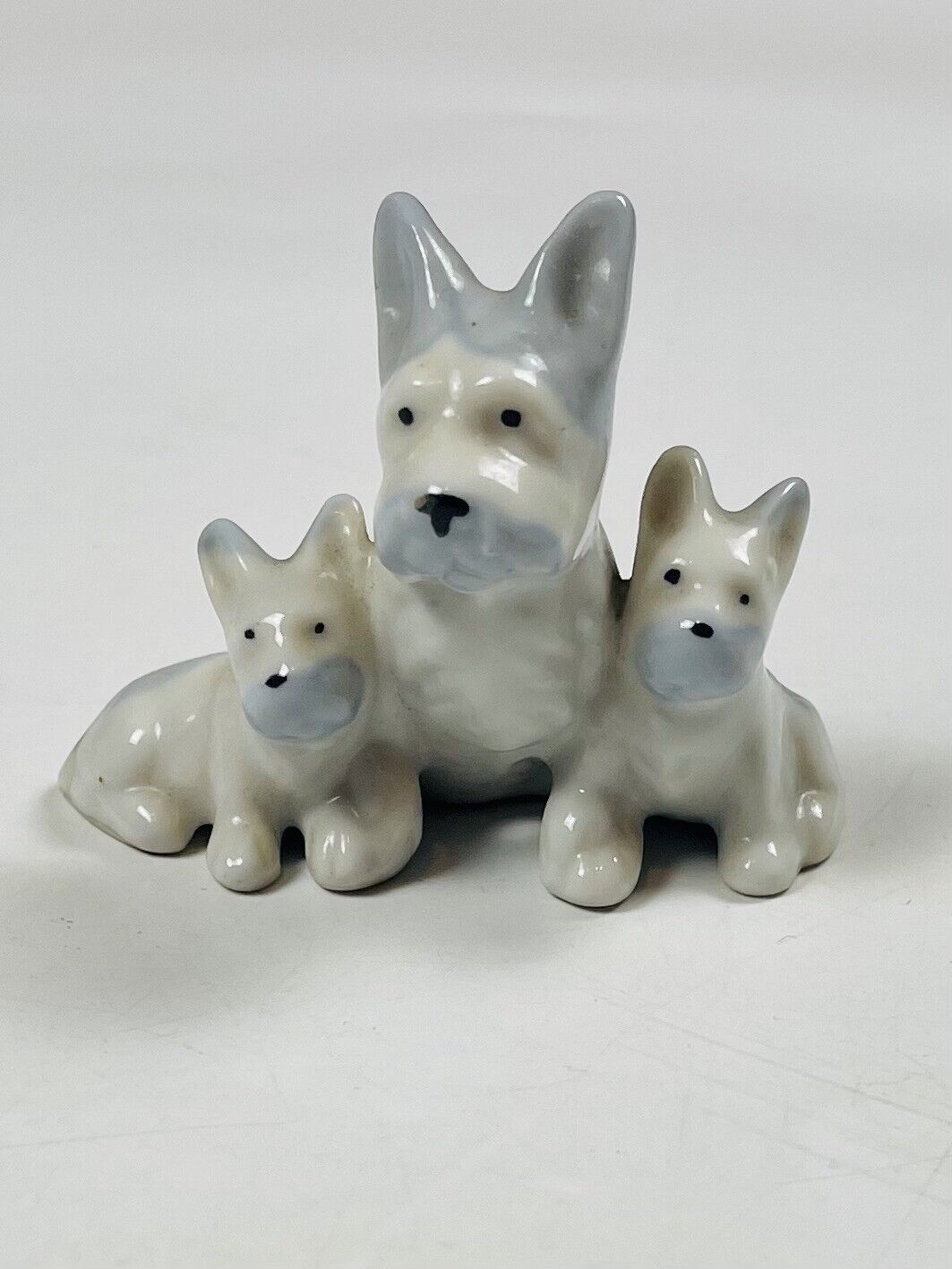 Vintage porcelain terrier dog with puppies blue white no markings