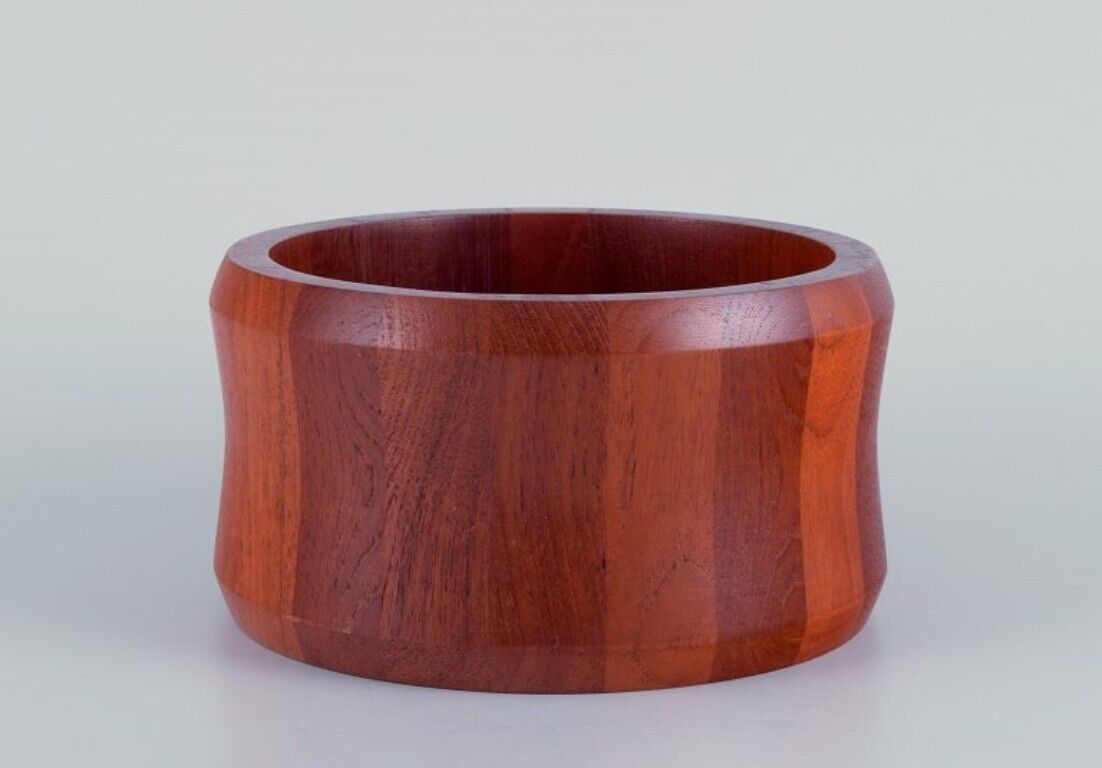 Kjeni, Denmark. Teakwood bowl. Beautiful wood grain and color variation.