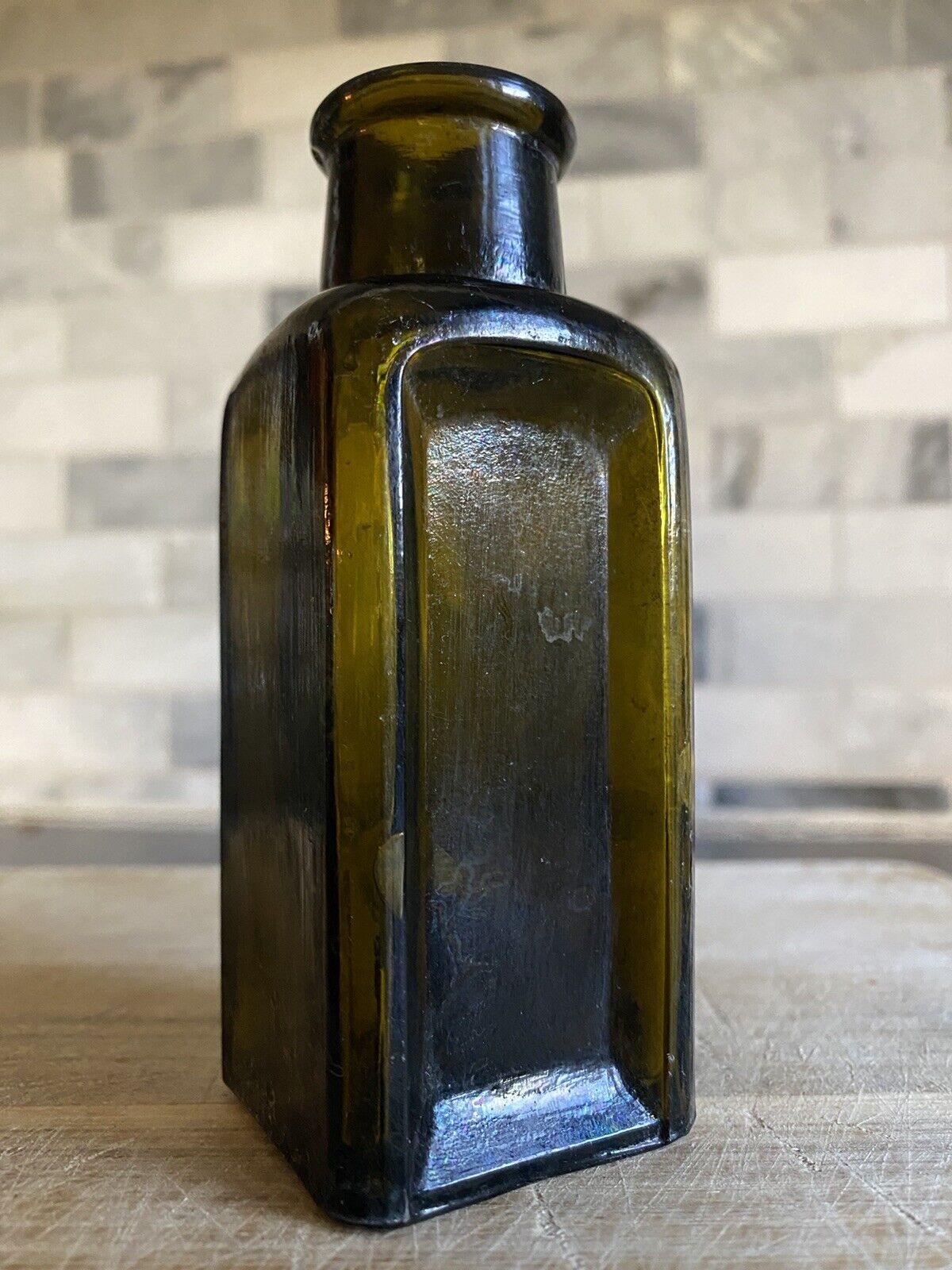 Scarce Dark Olive Green 5.75” Multi Sided 1890’s Bottle