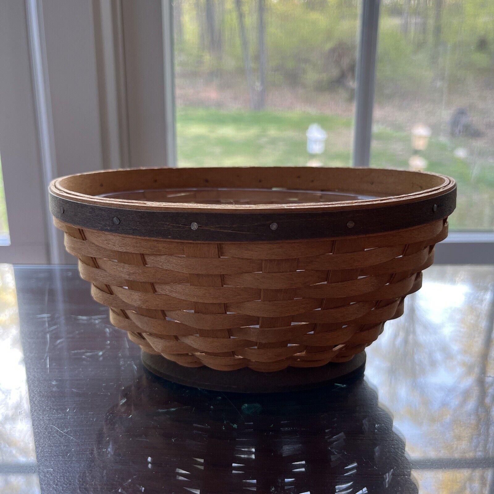 Vintg 2008 Longaberger small oval basket 3 3/4 Inches high. 7 1/4 by 5 Inches...