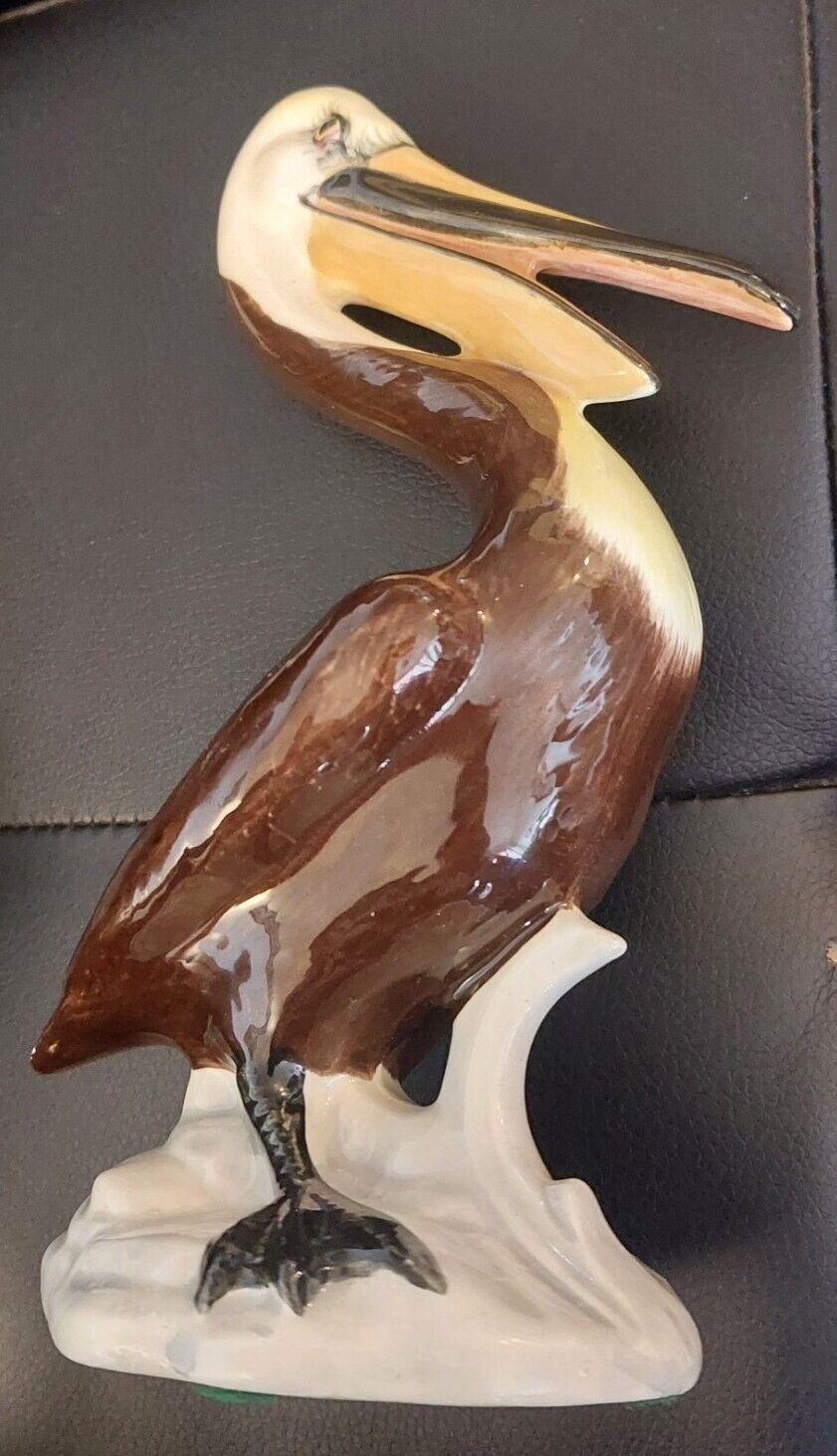 ceramic pelican statue